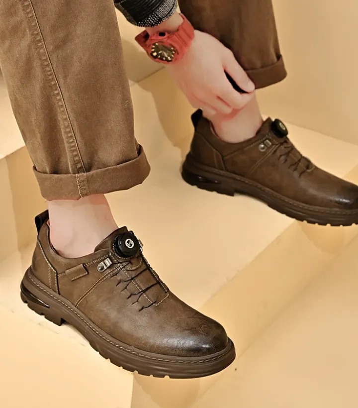 A woman models a black Tiny Spark hoodie with a vibrant graphic print, red sunglasses, and a silver chain, ideal for street style collections.